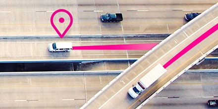 An overhead view of business vehicles in transit.