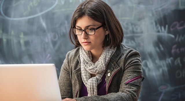 Young woman using laptop