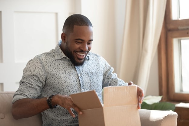 Man opening a box.