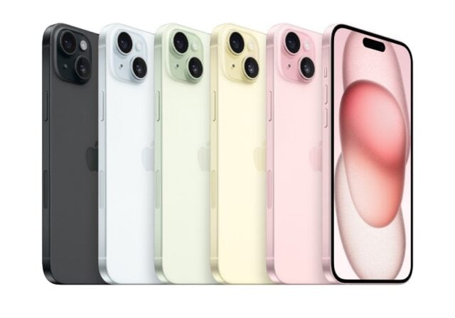 Six iPhone 15 phones of different colors including black, blue, green, yellow, and pink.