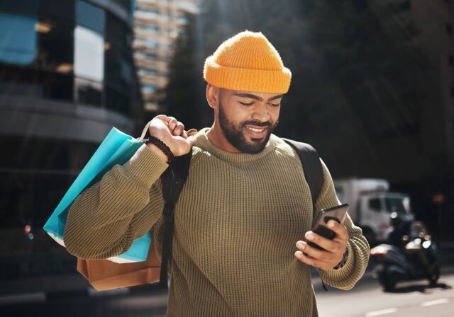 A student with shopping bags