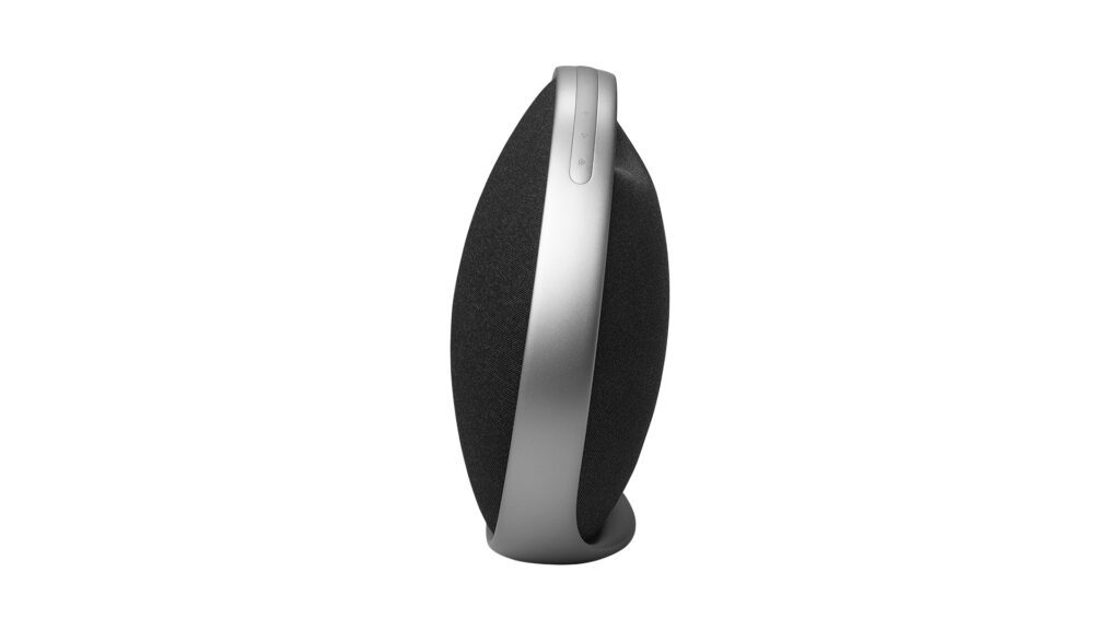 A side view of a black Harman Kardon Onyx Studio 9 Bluetooth speaker with a sleek silver handle and minimalist controls.