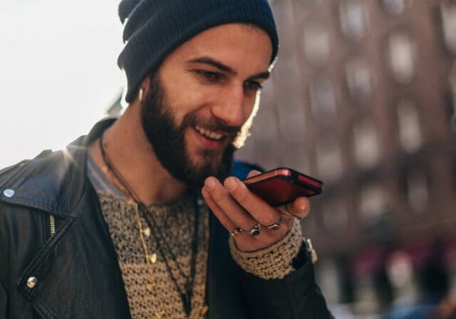 A person talking on a prepaid phone.