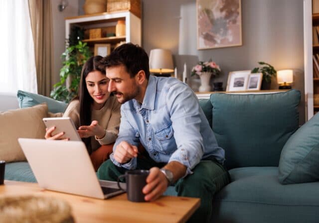 couple-freelancer-IT-using-laptop-and-tablet
