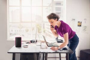 A person working remotely with Wi-Fi from their Gateway.