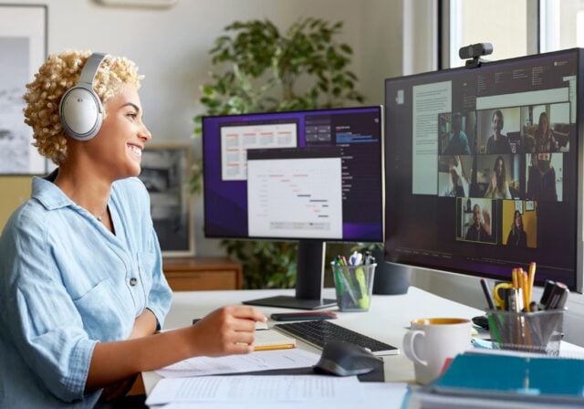 A person conducting a video conference call with a Wi-Fi 6 compatible camera.