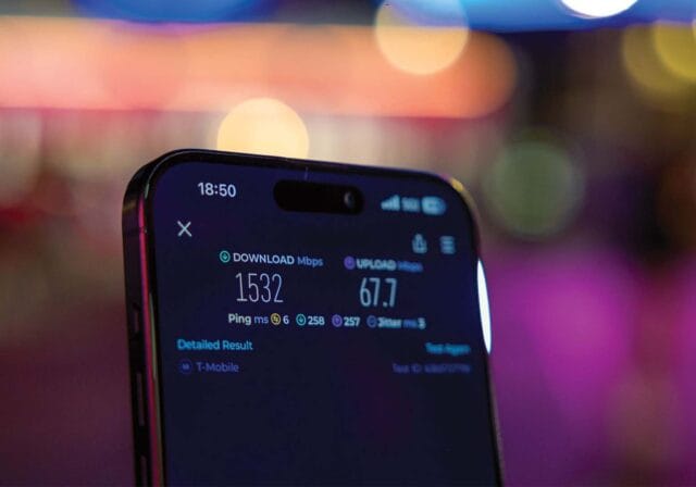 An image of a phone displaying an internet speed test.