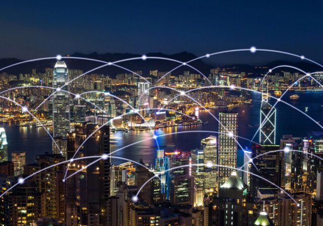 An image of a city being connected through fiber optic internet.
