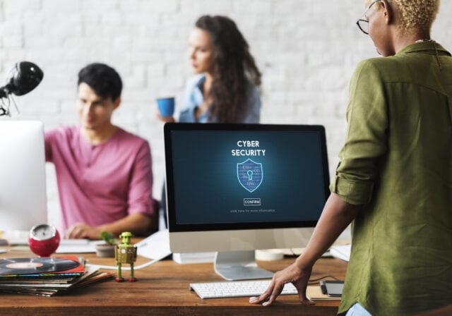 Woman-Using-Computer-Cybersecurity