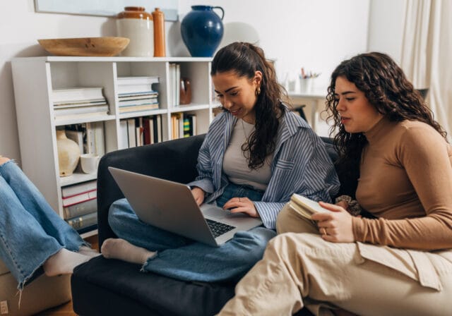 Young-women-using-internet-plan-on-laptop