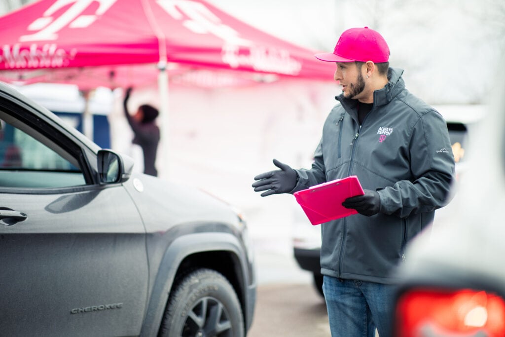 T-Mobile employees in Boise, Idaho organized curbside technology pickup so customer care teams can work from home during COVID-19 pandemic.