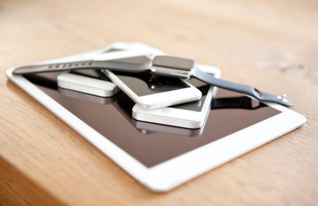 Several Apple brand products stacked on top of each other