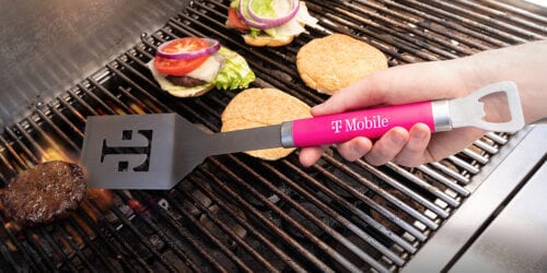 flipping burgers with a t-mobile spatula