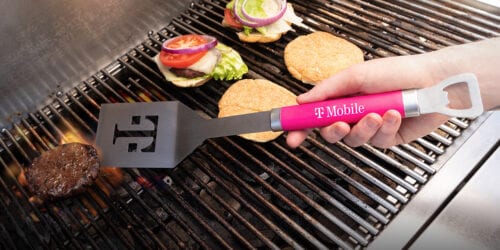 flipping burgers with a t-mobile spatula