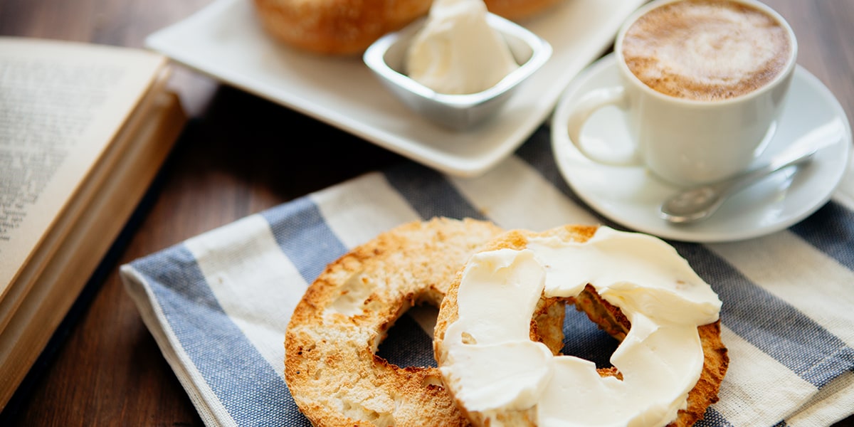 bagel with cream cheese and coffee