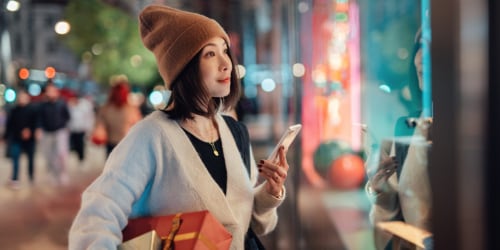 Unique holiday gift ideas - Woman at shopping window