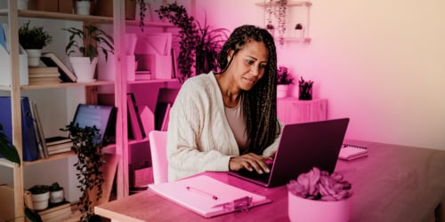 Woman on laptop enjoying internet backup plans with more data