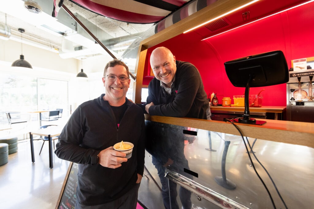 Jon Freier, T-Mobile’s President of Consumer Group, hands out frozen treats with a smile